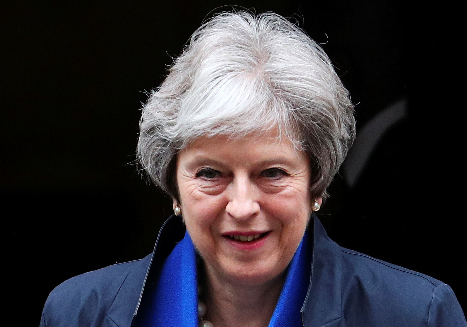 File picture of Britain's Prime Minister Theresa May walking out of 10 Downing Street in London