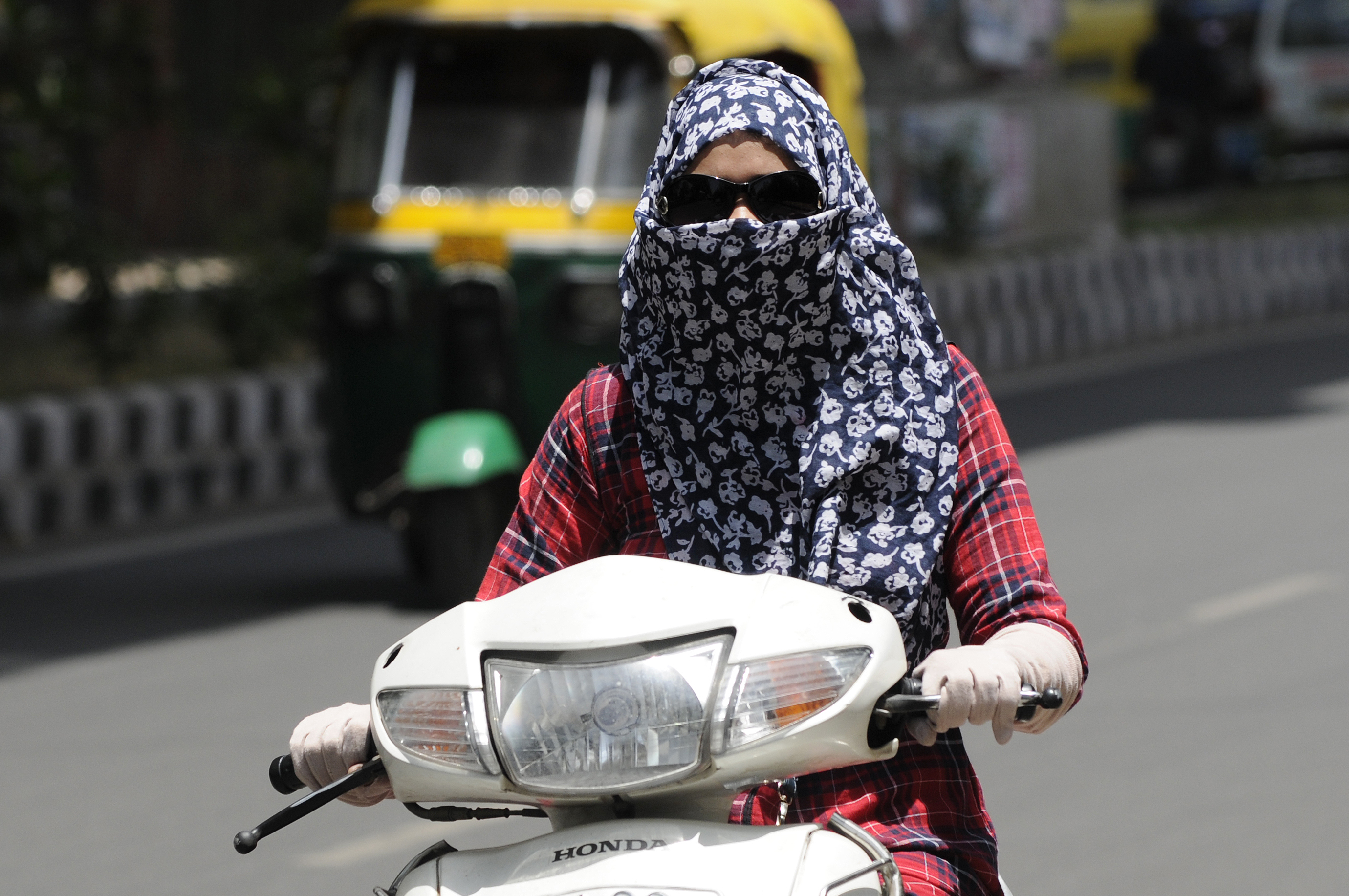 Now, fine for women riding without helmet