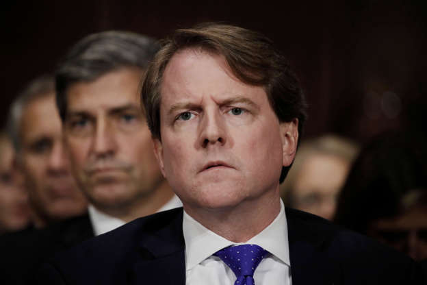 Slide 4 of 114: White House counsel Don McGahn listens to US Supreme Court nominee Brett Kavanaugh testify before a Senate Judiciary Committee confirmation hearing on Capitol Hill in Washington, U.S., September 27, 2018.