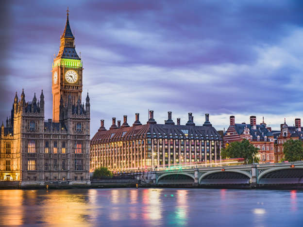 A beautiful scenery of Westminster bridge, part of the Houses of Parliament and Big Ben, the long exposure allowed beautiful effect on clouds and Thames river surface