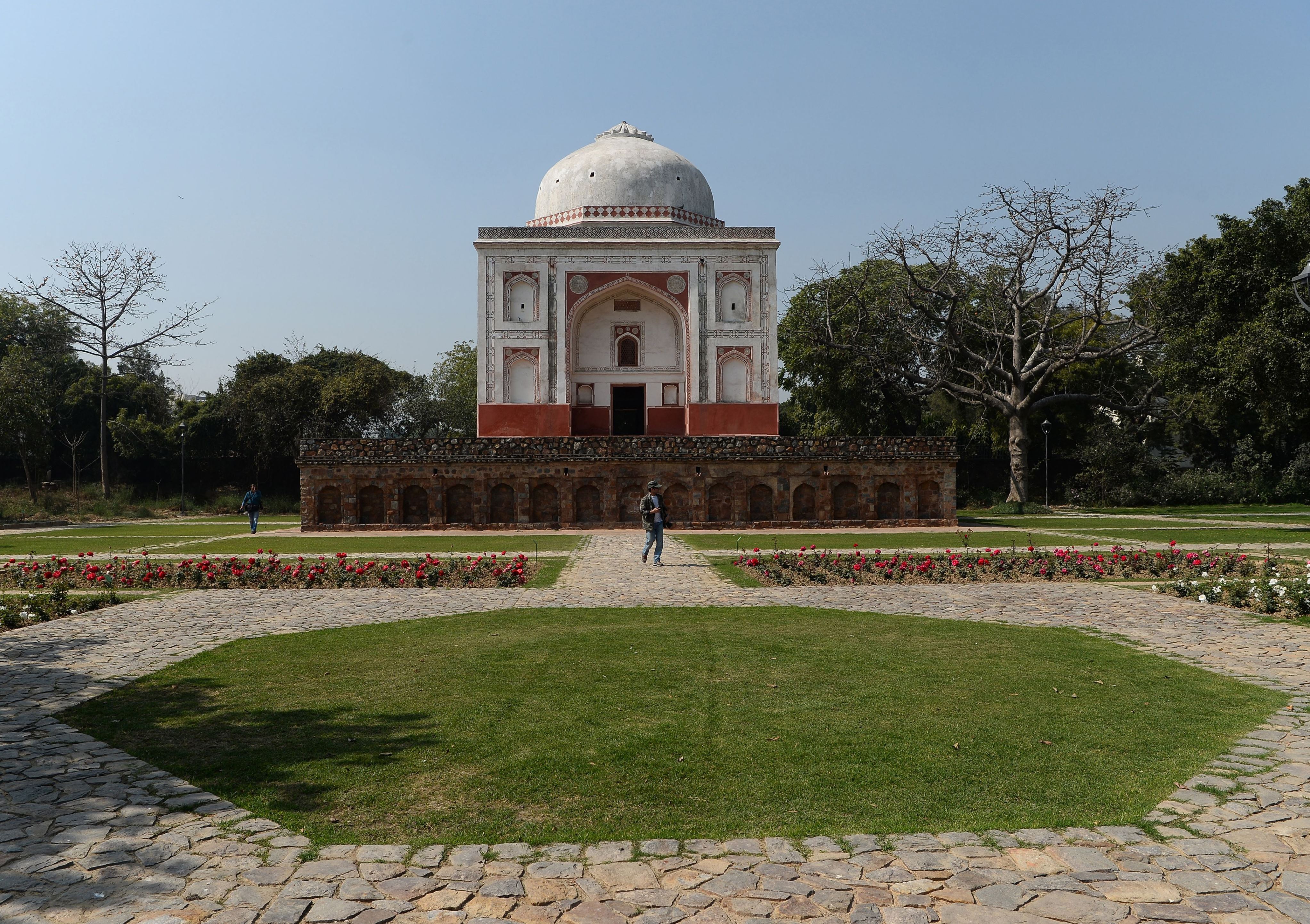 Slide 25 of 77: This photo taken on February 20, 2018 shows the renovated Lakkarwala Burj tomb in Sunder Nursery, a 16th-century heritage garden complex adjacent to Indian UNESCO site Humayun's Tomb, in New Delhi. 
A once forgotten Mughal garden in the heart of New Delhi will reopen on February 21 after years of painstaking conservation work, creating a new public park in India's sprawling and smog-choked capital. The 90-acre (36-hectare) garden will be formally opened by the Aga Khan, whose Trust for Culture has helped recreate the classical garden and restore its crumbling 16th-century monuments.
 / AFP PHOTO / Sajjad HUSSAIN        (Photo credit should read SAJJAD HUSSAIN/AFP/Getty Images)