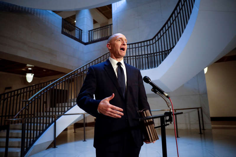 FILE - In a Nov. 2, 2017 file photo, Carter Page, a foreign policy adviser to Donald Trump's 2016 presidential campaign, speaks with reporters following a day of questions from the House Intelligence Committee, on Capitol Hill in Washington. President Donald Trump claimed Sunday, July 22, 2018, that newly released documents relating to the wiretapping of his onetime campaign adviser Carter Page "confirm with little doubt" that intelligence agencies misled the courts that approved the warrant. But lawmakers from both parties say the documents don't show wrongdoing.(AP Photo/J. Scott Applewhite, File)