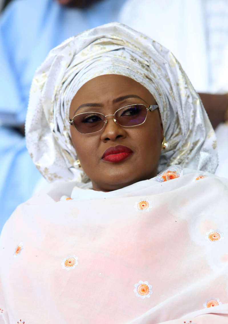 In this photo taken Friday, May. 29, 2015, Nigeria's first lady Aisha Buhari, attends a function in Abuja, Nigeria. Nigeria's first lady has openly questioned her husband's work and said she may not support him if he runs again â€” comments that President Muhammadu Buhari laughed off, saying, "I don't know which party my wife belongs to, but she belongs to my kitchen and my living room and the other room." ï»¿(AP Photo/Azeez Akunleyan )