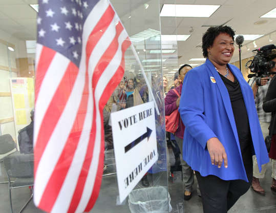 Slide 3 of 15: Mandatory Credit: Photo by TAMI CHAPPELL/EPA-EFE/REX/Shutterstock (9940539e) Democratic Gubernatorial Candidate Stacey Abrams leaves after voting early at the South DeKalb Mall polling location in Decatur, Georgia, USA, 22 October 2018. Abrams faces Republican nominee Brian Kemp in the state of Georgia gubernatorial election. Democratic Gubernatorial Candidate Stacey Abrams, Decatur, USA - 22 Oct 2018