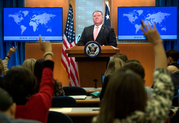 Slide 4 of 96: TOPSHOT - US Secretary of State Mike Pompeo gives a press conference at the US Department of State in Washington, DC on October 23, 2018. - The United States is revoking the visas of Saudis found to be involved in the killing of journalist Jamal Khashoggi inside the kingdom