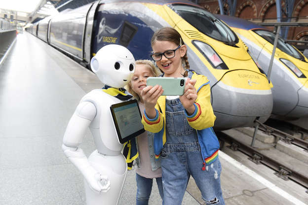 London, Britain - Tabatha Fireman/Eurostar/Getty Images Slide 32 of 39: Pepper the robot meets Eurostar customers at St Pancras International station in London, England. Pepper will be available to entertain customers, offering information about their journey before departure on Oct. 23.