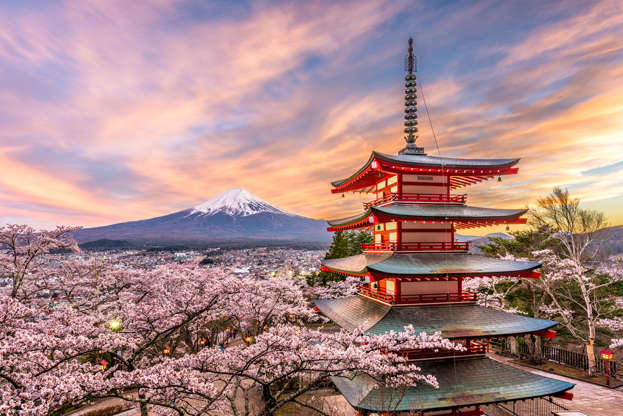 Slide 51 of 51: Fujiyoshida, Japan at Chureito Pagoda and Mt. Fuji in the spring with cherry blossoms.