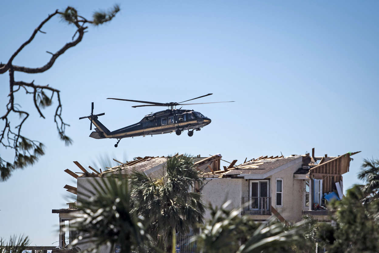 Slide 1 of 92: A US Customs and Border Patrol helicopter lands near destroyed homes after category 4 Hurricane Michael made land fall along the Florida panhandle Wednesday, on Friday, Oct. 12, 2018 in Mexico Beach, FL. (Photo by Jabin Botsford/The Washington Post via Getty Images)