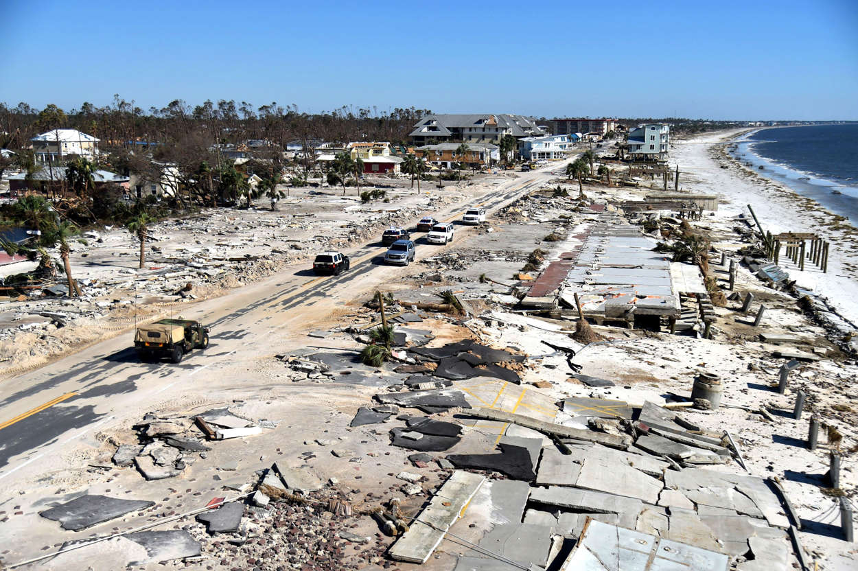 Slide 4 of 92: View of the damaged caused by Hurricane Michael in Mexico Beach, Florida, on October 12, 2018. - In devastated Mexico Beach, where Hurricane Michael unleashed its most violent rains and winds, residents are taking stock of the damage, reuniting with their loved ones -- and bracing for what will be a long, difficult clean-up operation. (Photo by HECTOR RETAMAL / AFP)        (Photo credit should read HECTOR RETAMAL/AFP/Getty Images)