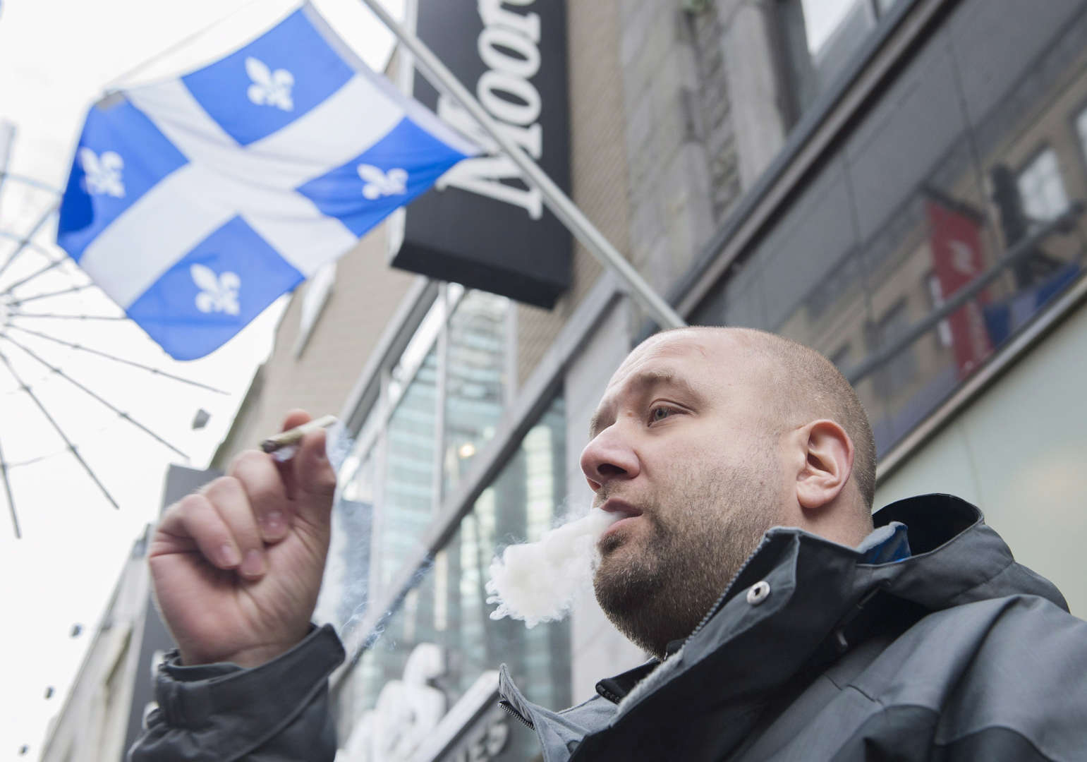 Hugo Senecal smokes his first legal cannabis joint after buying it from a government cannabis store ... - THE CANADIAN PRESS/Graham Hughes Slide 15 of 31: Hugo Senecal smokes his first legal cannabis joint after buying it from a government cannabis store in Montreal, Wednesday, October 17, 2018.