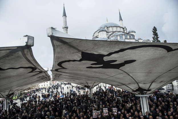 Slide 2 of 67: People attend a symbolic funeral prayer for Saudi journalist Jamal Khashoggi, killed and dismembered in the Saudi consulate in Istanbul, at the courtyard of Fatih mosque in Istanbul, on November 16, 2018. - Turkey has more evidence contradicting the Saudi version of the murder of journalist Jamal Khashoggi including a second audio recording, revealing that the murder had been premeditated, a Turkish newspaper reported on November 16, a contradiction to the statement of the Saudi prosecutor who said that five Saudi officials faced the death penalty on charges of killing Khashoggi but exonerated the country