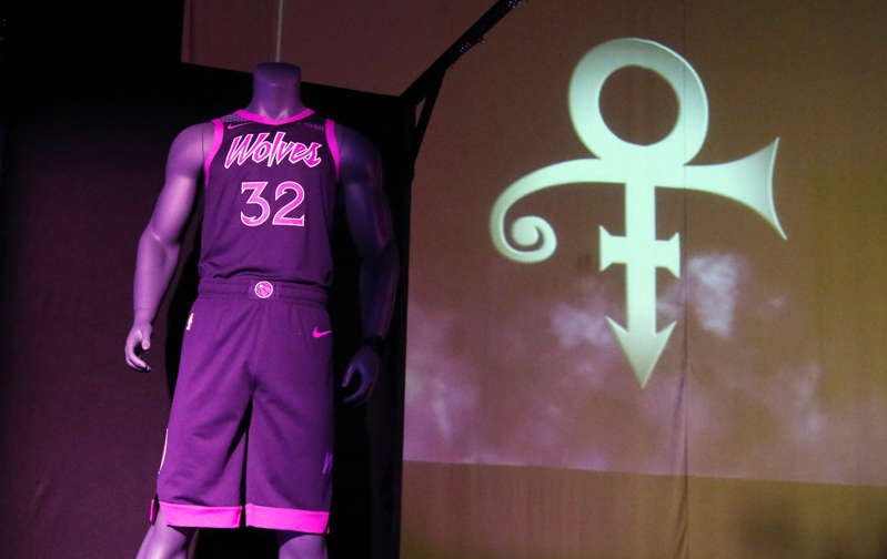 CAPTION: The new City Edition Minnesota Timberwolves uniform, honoring the legacy of the late rock star Prince, is unveiled Thursday, Nov. 1, 2018, in Chanhassen, Minn.