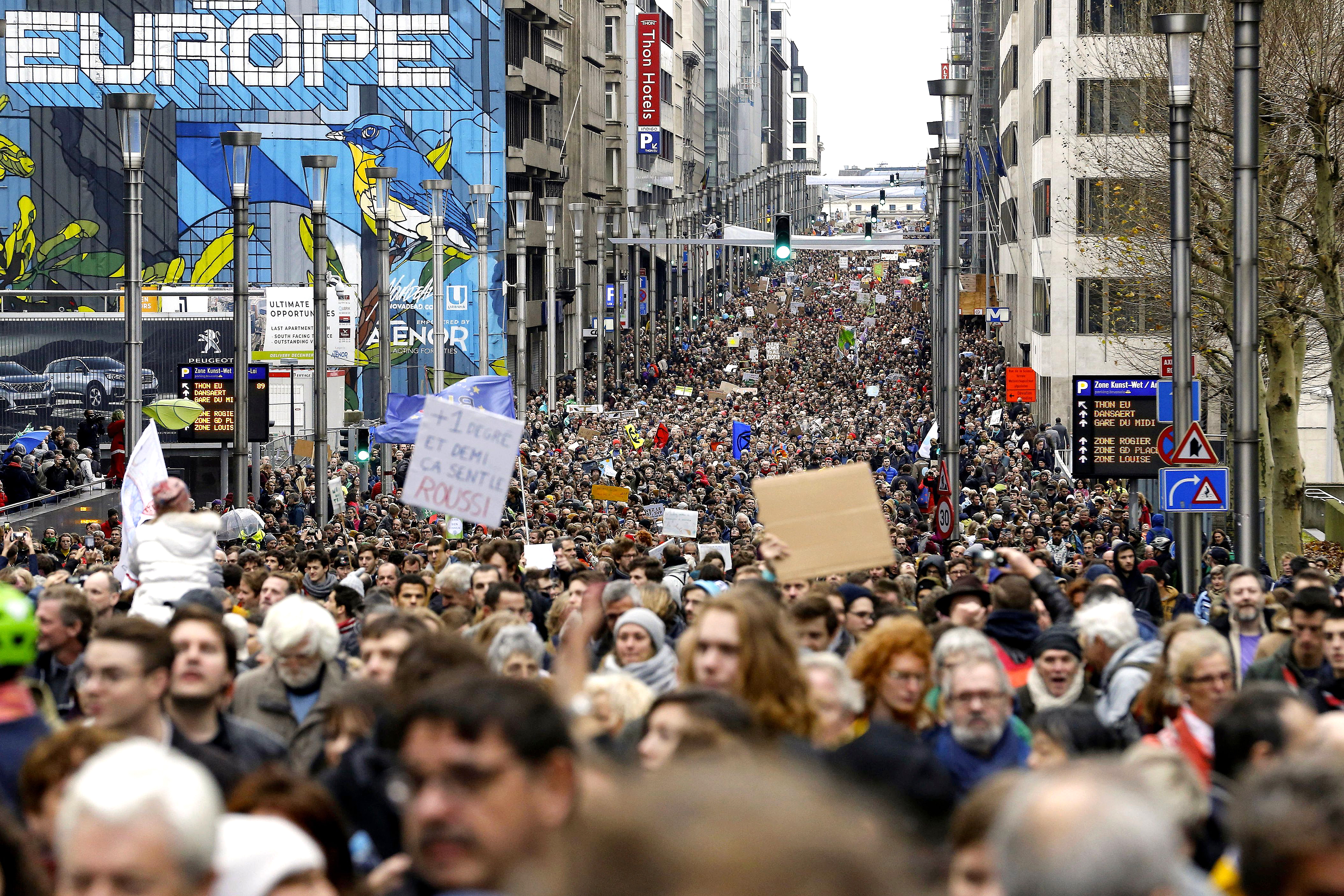 Slide 13 of 36: This picture taken on December 2, 2018 shows a general view of the "Claim the Climate" march in Brussels to raise awareness for climate change.