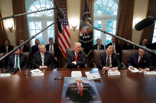 Slide 1 of 73: U.S. President Donald Trump attends a Cabinet meeting on day 12 of the partial U.S. government shutdown at the White House in Washington, U.S., January 2, 2019.