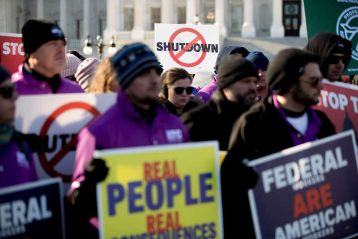 FILE - Air Traffic and pilot unions protest the government shutdown on Capitol Hill in Washington, Thursday, Jan. 10, 2019. (AP Photo/Andrew Harnik)
