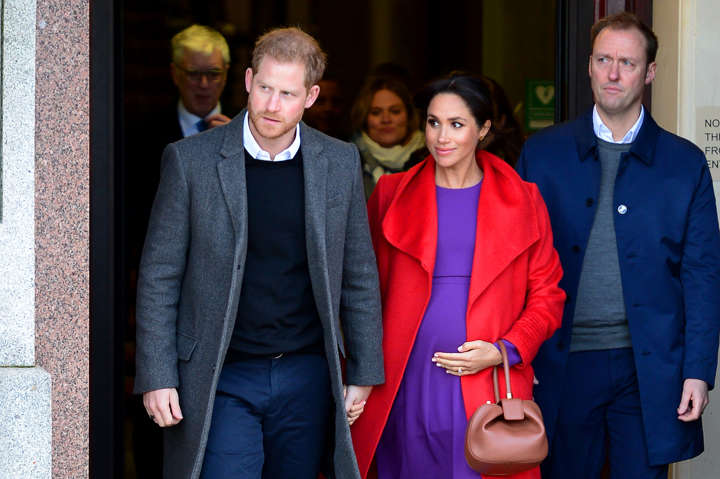 BIRKENHEAD, ENGLAND - JANUARY 14:  Prince Harry, Duke of Sussex and Meghan, Duchess of Sussex depart from Birkenhead Town Hall on January 14, 2019 in Birkenhead, England. (Photo by Richard Martin-Roberts/Getty Images)