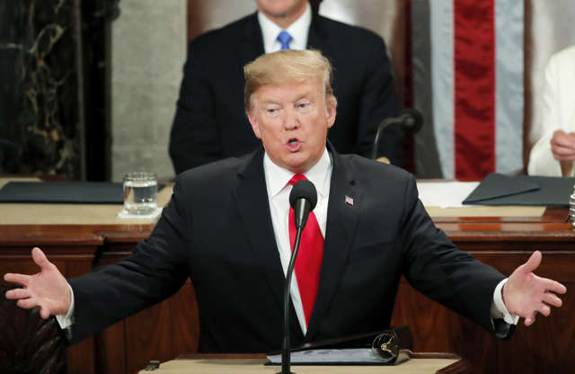 Slide 1 of 32: U.S. President Donald Trump delivers his State of the Union address to a joint session of Congress on Capitol Hill in Washington, U.S., February 5, 2019.