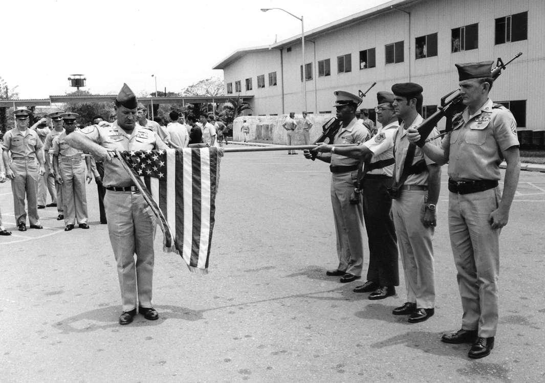 Slide 11 of 15: In this March 29, 1973 file photo, the American flag is furled at a ceremony marking official deactivation of the Military Assistance Command-Vietnam (MACV) in Saigon, after more than 11 years in South Vietnam. While the fall of Saigon in 1975 — with its indelible images of frantic helicopter evacuations — is remembered as the final day of the Vietnam War, March 29 marks an anniversary that holds greater meaning for many who fought, protested or otherwise lived the war.