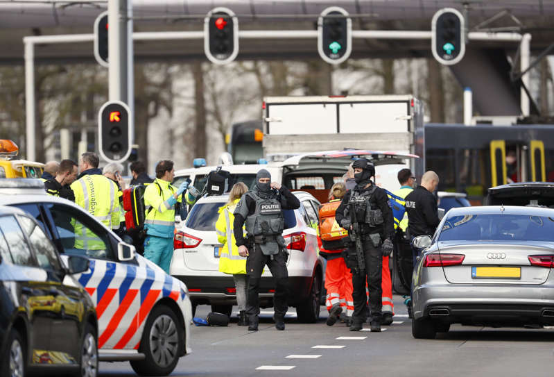 Emergency services stand at the 24 Oktoberplace in Utrecht, on March 18, 2019, where a shooting took place. (ROBIN VAN LONKHUIJSEN/AFP/Getty Images)