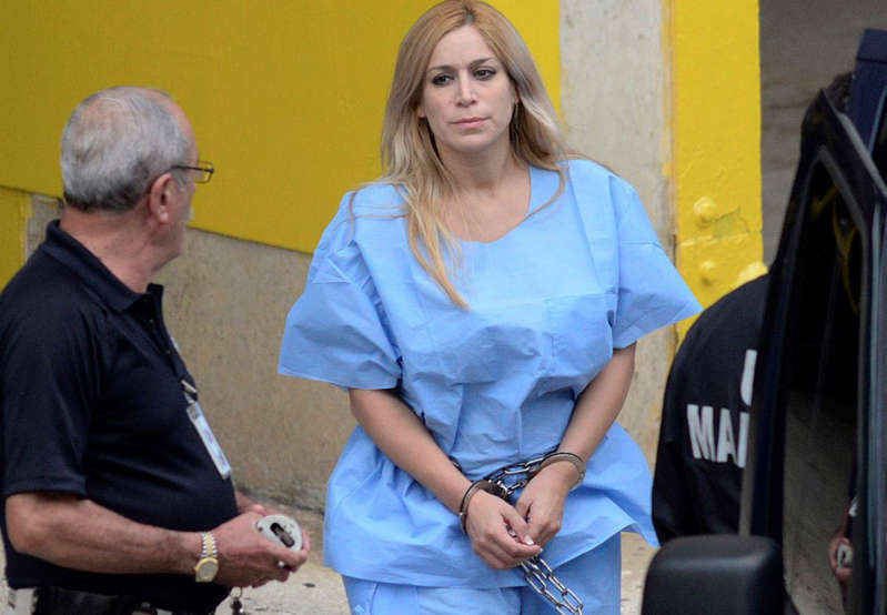 This Sept. 24, 2015 file photo shows Aurea Vazquez Rijos, who was accused more than a decade ago of the murder of her wealthy husband, Canadian Adam Anhang, in San Juan, Puerto Rico.