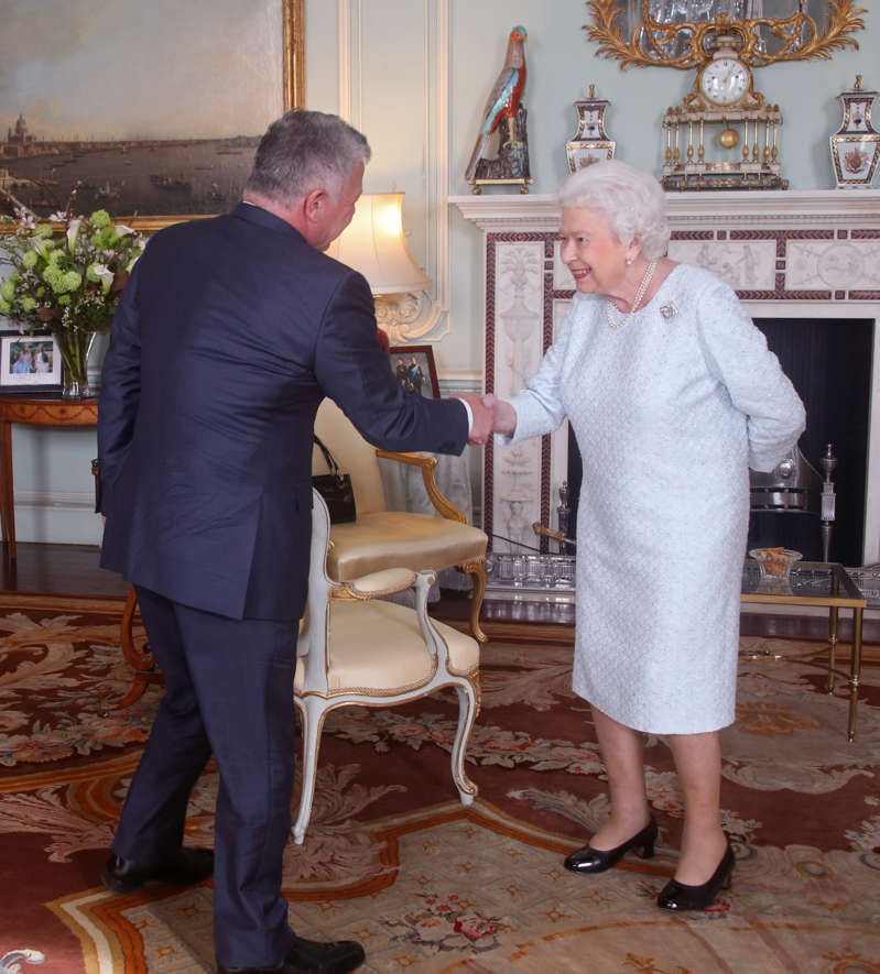 Britain's Queen Elizabeth II greets King Abdullah II of Jordan during a private audience at Buckingham Palace, London, Britain, February 28, 2019. Yui Mok/Pool via REUTERS