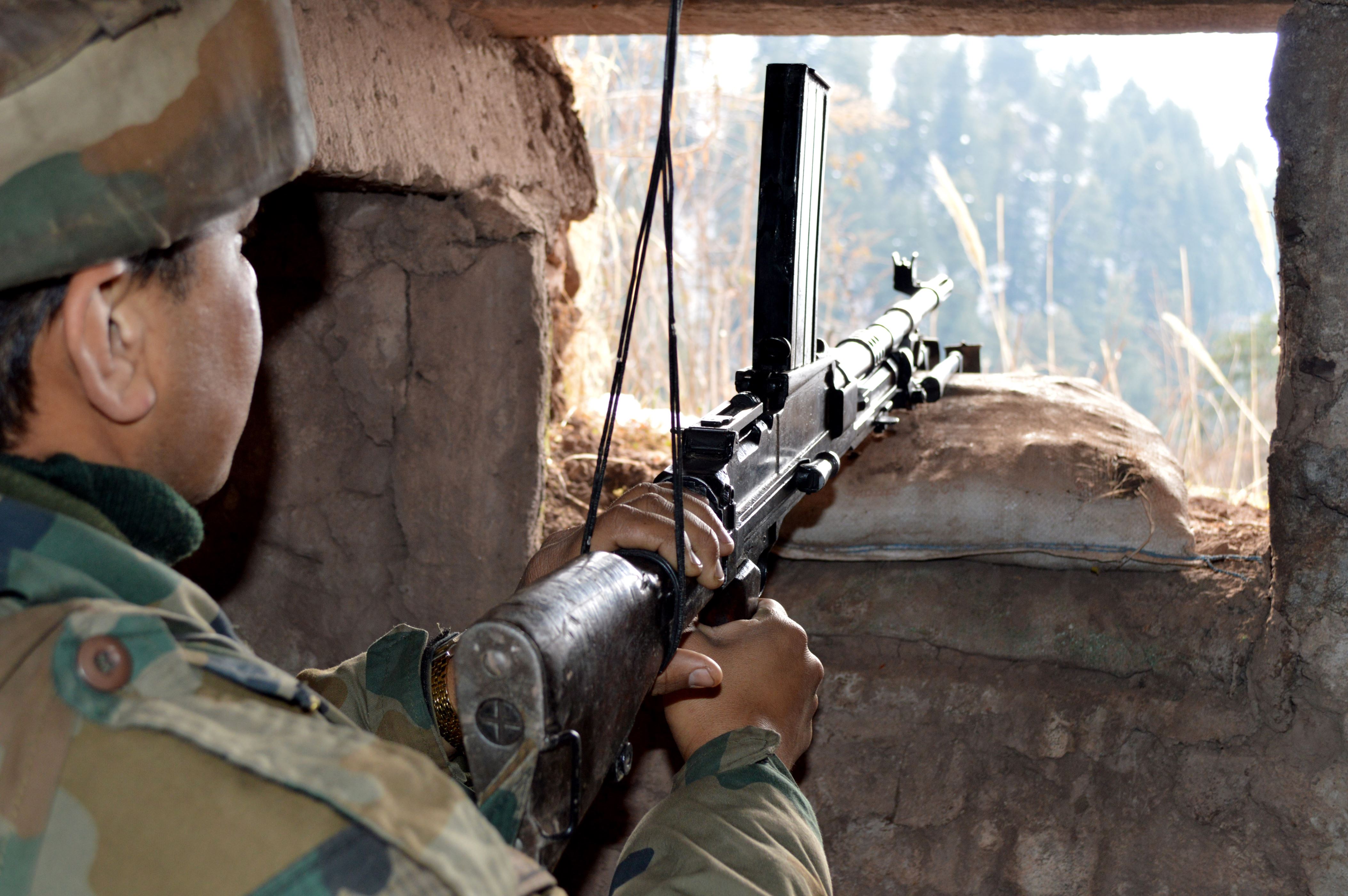 Photo taken on 14 Jan 2014: Amid the border skirmish with Pakistan, India has deployed more forces at the forward posts of the LoC. (Photo by Nasir Kachroo/NurPhoto via Getty Images)