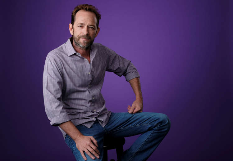 Luke Perry, a cast member in the CW series "Riverdale," poses for a portrait during the 2018 Television Critics Association Summer Press Tour, Monday, Aug. 6, 2018, in Beverly Hills, Calif. (Photo by Chris Pizzello/Invision/AP)