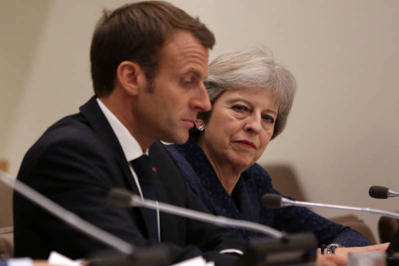 French President Emmanuel Macron  and British Prime Minister Theresa May attend a Girl Education event at UN headquarters during the General Assembly of the United Nations in New York, September 25, 2018. (Photo by AMR ALFIKY / POOL / AFP)        (Photo credit should read AMR ALFIKY/AFP/Getty Images)