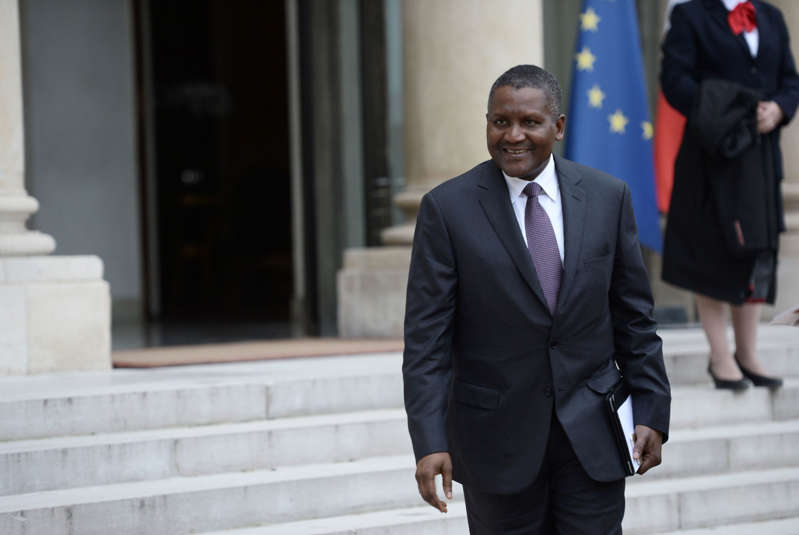 File Photo-Nigerian businessman and Africa's richest man Aliko Dangote leaves the Elysee presidential Palace following a meeting between French President and French and African businessmen