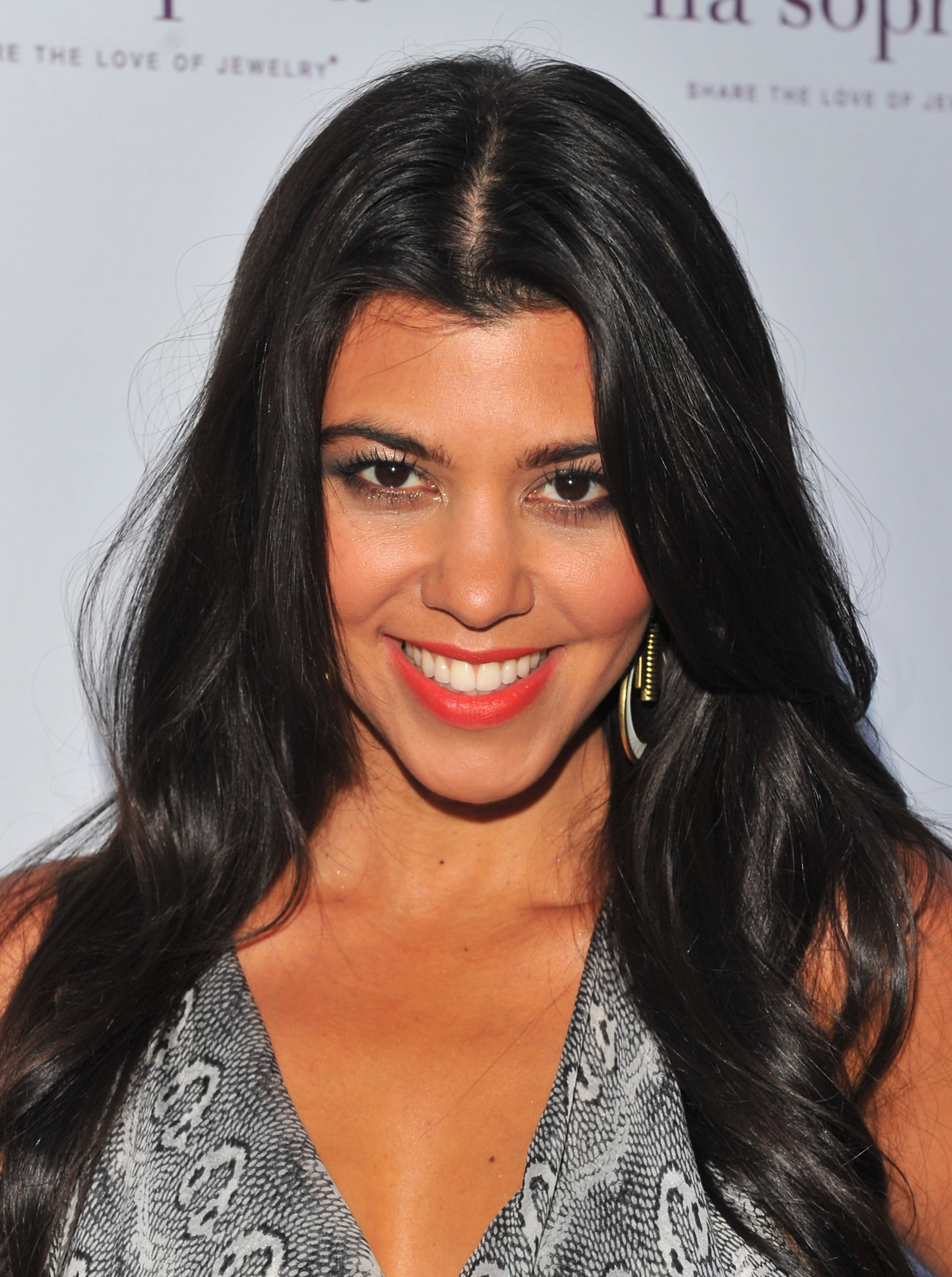 WEST HOLLYWOOD, CA - JULY 26:  TV personality Kourtney Kardashian arrives to the unveiling of lia sophia's latest jewelry creations at the Sunset Marquis Hotel on July 26, 2011 in West Hollywood, California.  (Photo by Alberto E. Rodriguez/Getty Images)