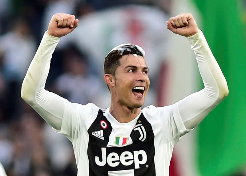 Juventus' Cristiano Ronaldo celebrates winning the league after the match