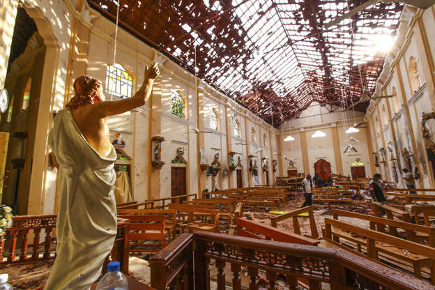 Slide 1 of 56: Officials inspect the damaged St. Sebastian's Church after multiple explosions targeting churches and hotels across Sri Lanka on April 21, in Negombo, north of Colombo, Sri Lanka.