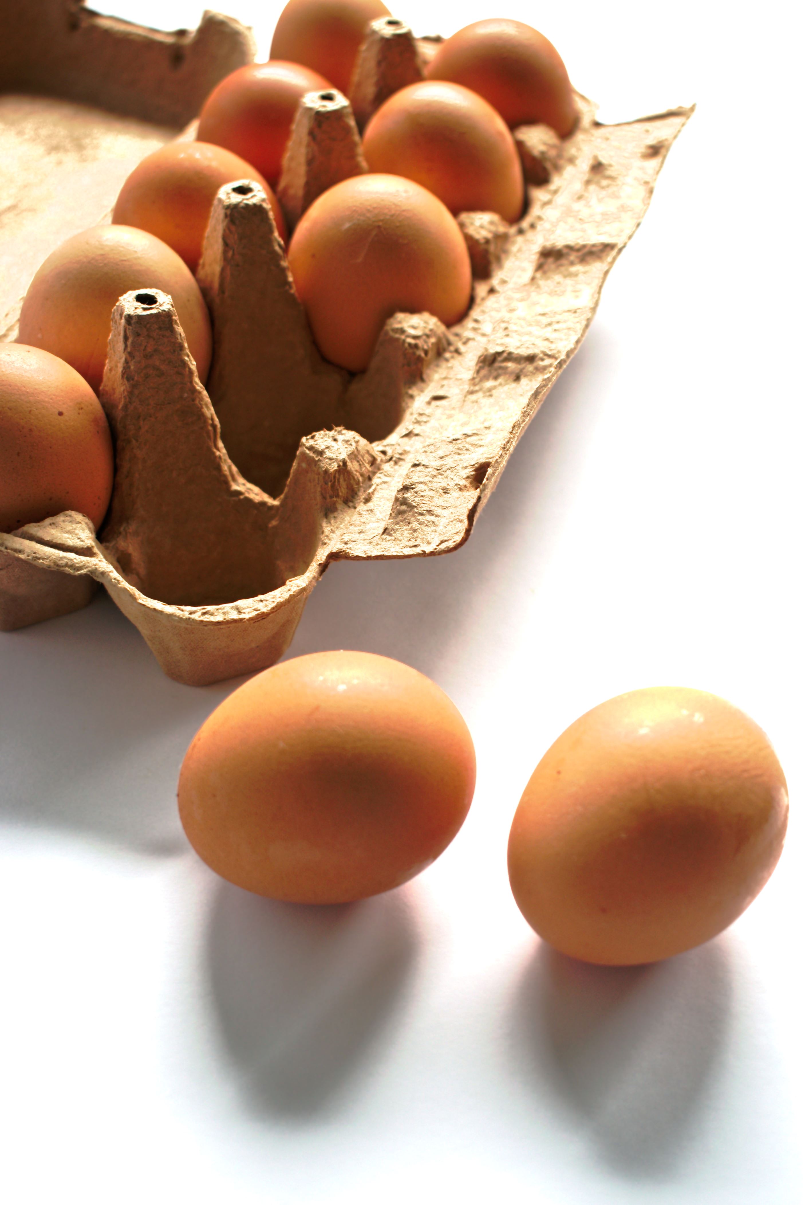 Closeup of brown eggs in a carton