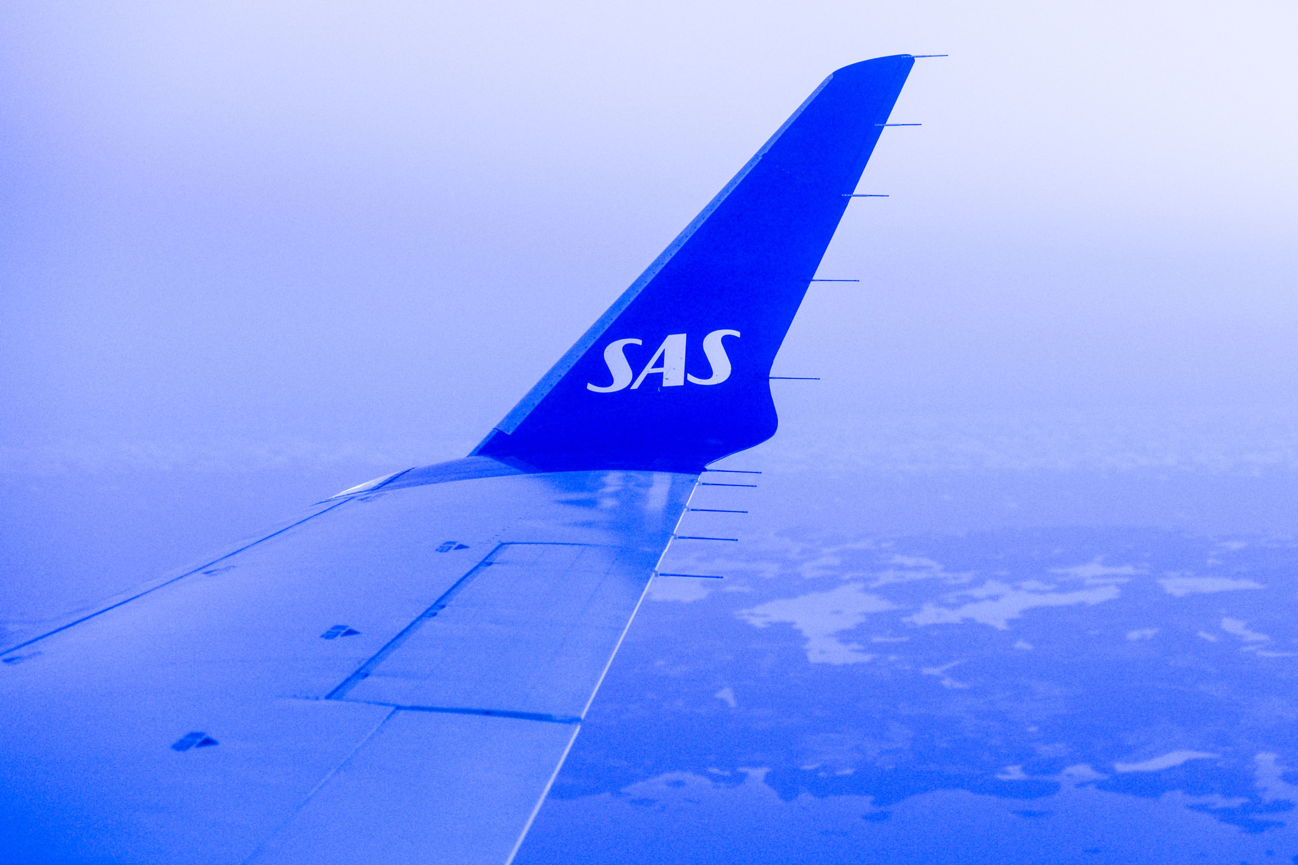 Scandinavian Airlines (SAS) plane over Stockholm Arlanda Airport. 
On Monday, March 06, 2017, in Stockholm, Sweden. (Photo by Artur Widak/NurPhoto via Getty Images)