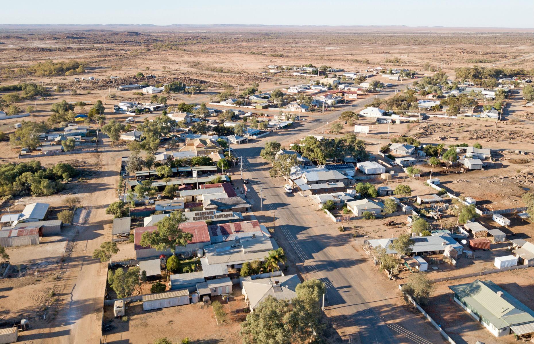 <p>A 17-hour drive northwest of Sydney, Tibooburra is in “Corner Country” – set near the borders of NSW, Queensland and South Australia. As with others, the small town has been affected by NSW’s <a href="https://www.abc.net.au/news/2019-09-16/drought-now-affecting-even-the-greenest-parts-of-the-country/11487026">worst-ever drought</a> in recent years. Get chatting to the hardy locals at the friendly <a href="https://tibooburra.com.au/the-family-hotel.html">Family Hotel</a> to hear about life in the outback, then get out into the vast surrounds of the Sturt National Park. See 450-million-year-old granite tors and take a walk along a section of the dingo fence, the world’s largest man-made fence. </p>