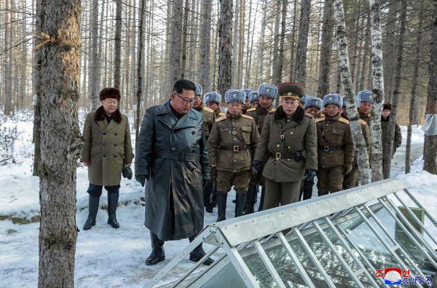 Slide 1 of 65: This undated photo provided on Wednesday, Dec. 4, 2019, by the North Korean government shows North Korean leader Kim Jong Un, center, visits Mount Paektu area, North Korea. North Korea says leader Kim has taken a second ride on a white horse to a sacred mountain in less than two months. Independent journalists were not given access to cover the event depicted in this image distributed by the North Korean government. The content of this image is as provided and cannot be independently verified. Korean language watermark on image as provided by source reads: 