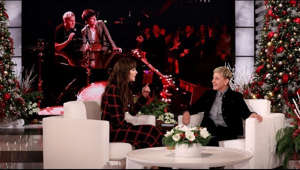 a person standing in front of a wedding cake: Dakota Johnson revealed to Ellen that her favorite comedian is Tig Notaro, who did a standup set during her recent 30th birthday party. The actress also opened up about what it was like on the set for "The Peanut Butter Falcon" with co-star Shia LaBeouf, who was arrested while filming the movie.

#DakotaJohnson
#TheEllenShow
#Ellen
