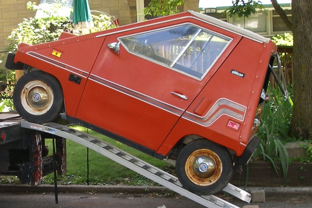 <p>We'll forgive you if you mistake the CitiCar for an <a href="https://blog.cheapism.com/theme-parks-then-and-now/">amusement park ride</a> or an overgrown wedge of cheese. In reality, this weird, triangular little contraption was an electric car built to appeal to consumers during the American oil crisis in the mid-'70s, the same era as the AMC Pacer. "It was <a href="https://carbuzz.com/news/horrible-small-cars-vanguard-citicar">a glorified golf cart</a> which must have been absolutely miserable to drive in actual traffic," opines CarBuzz, noting that the car produced a top speed of 25 mph and a whopping 40-mile range. Amazingly, around 4,400 of them actually sold.</p>