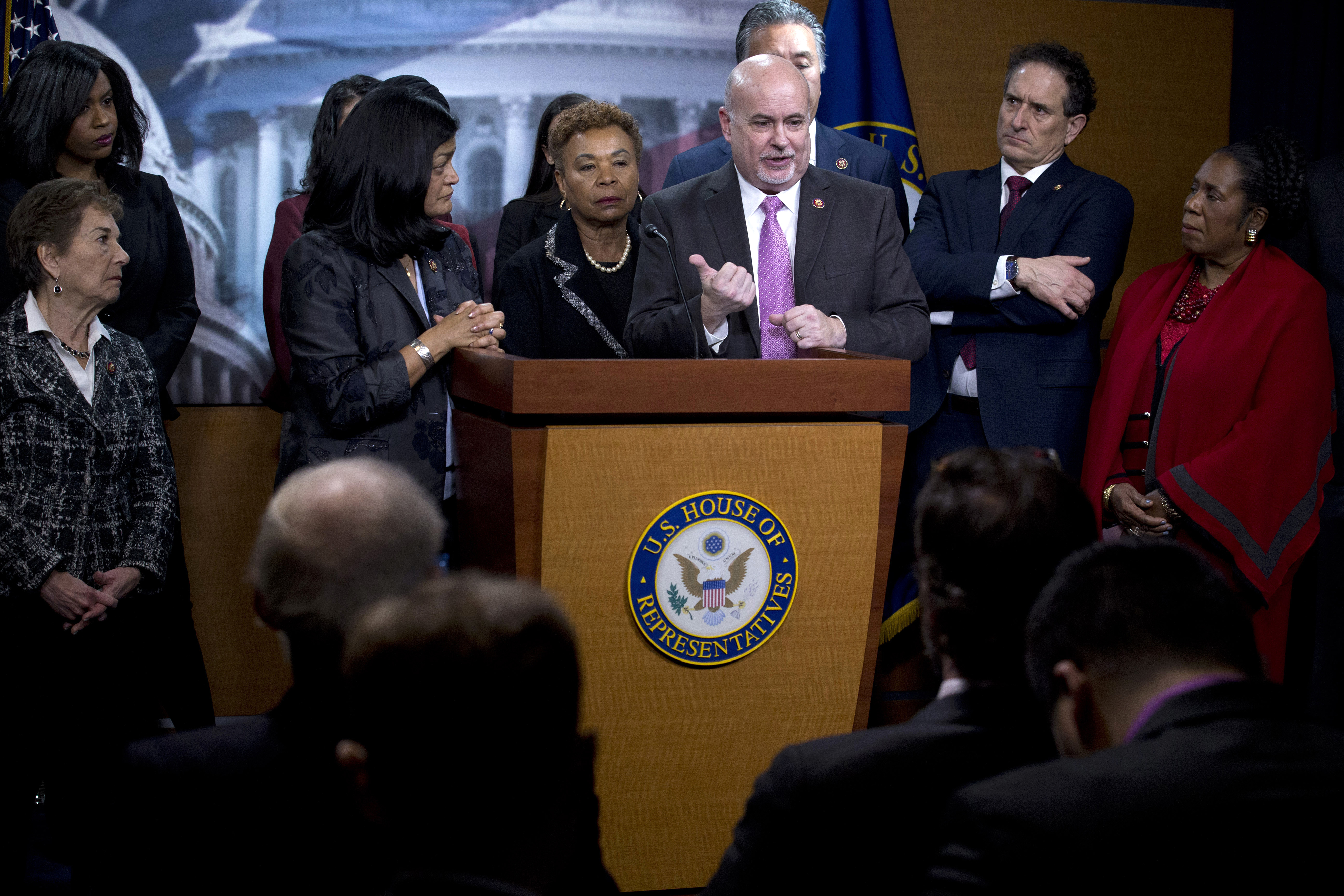 Slide 3 of 55: Congressional Progressive Caucus members Rep. Mark Pocan, D-Wis., center right, accompanied by Rep. Pramila Jayapal, D-Wash., Rep. Barbara Lee, D-Calif., and other members of the Caucus, speaks during a news conference on last week's targeted killing of Iran's senior military commander Gen. Qassem Soleimani on Capitol Hill, in Washington, Wednesday, Jan. 8, 2020.
