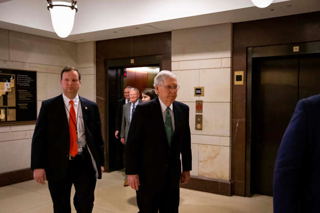 Slide 2 of 55: U.S. Senate Majority Leader Mitch McConnell (R-KY) departs following a briefing on developments with Iran after attacks by Iran on U.S. forces in Iraq, at the U.S. Capitol in Washington, U.S., January 8, 2020.