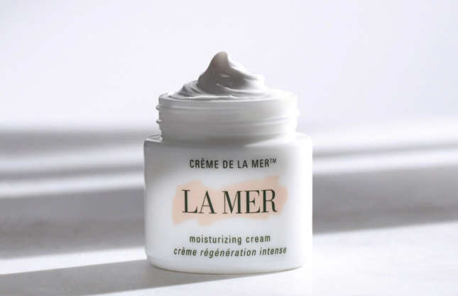 Slide 3 of 27: Crème de la Mer is an anti-ageing ‘miracle’ cream that currently costs $190 (£137) for a one-ounce (30g) tub, which works out at $6.33 (£4.57) per gram. Known for reducing wrinkles, Crème de la Mer is the most famous moisturiser in the world and is currently owned by the cosmetic giant Estée Lauder. Some of its age-defying ingredients include seaweed, natural sea and plant oils, lime extract, and wax-like thinning agents.