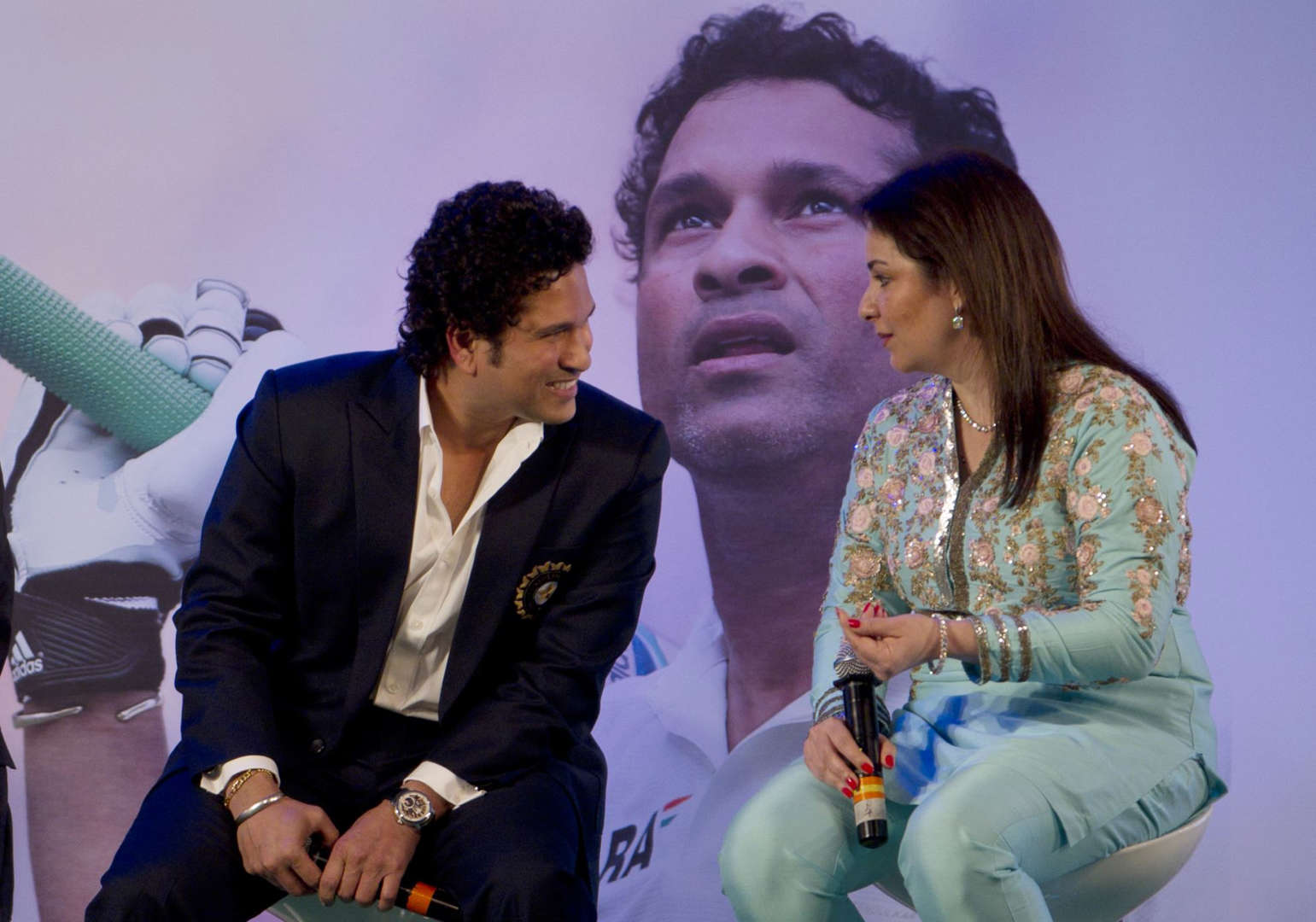 Slide 2 of 13: Indian Cricket legend Sachin Tendulkar with wife Anjali Tendulkar during the release of his autobiography 'Playing It My Way' on November 5, 2014 in Mumbai, India.