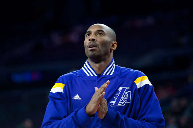Slide 1 of 33: Dec 2, 2014; Auburn Hills, MI, USA; Los Angeles Lakers guard Kobe Bryant (24) warms up prior to the game against the Detroit Pistons at The Palace of Auburn Hills.