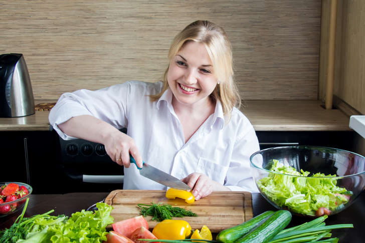 Woman chopping vegetables