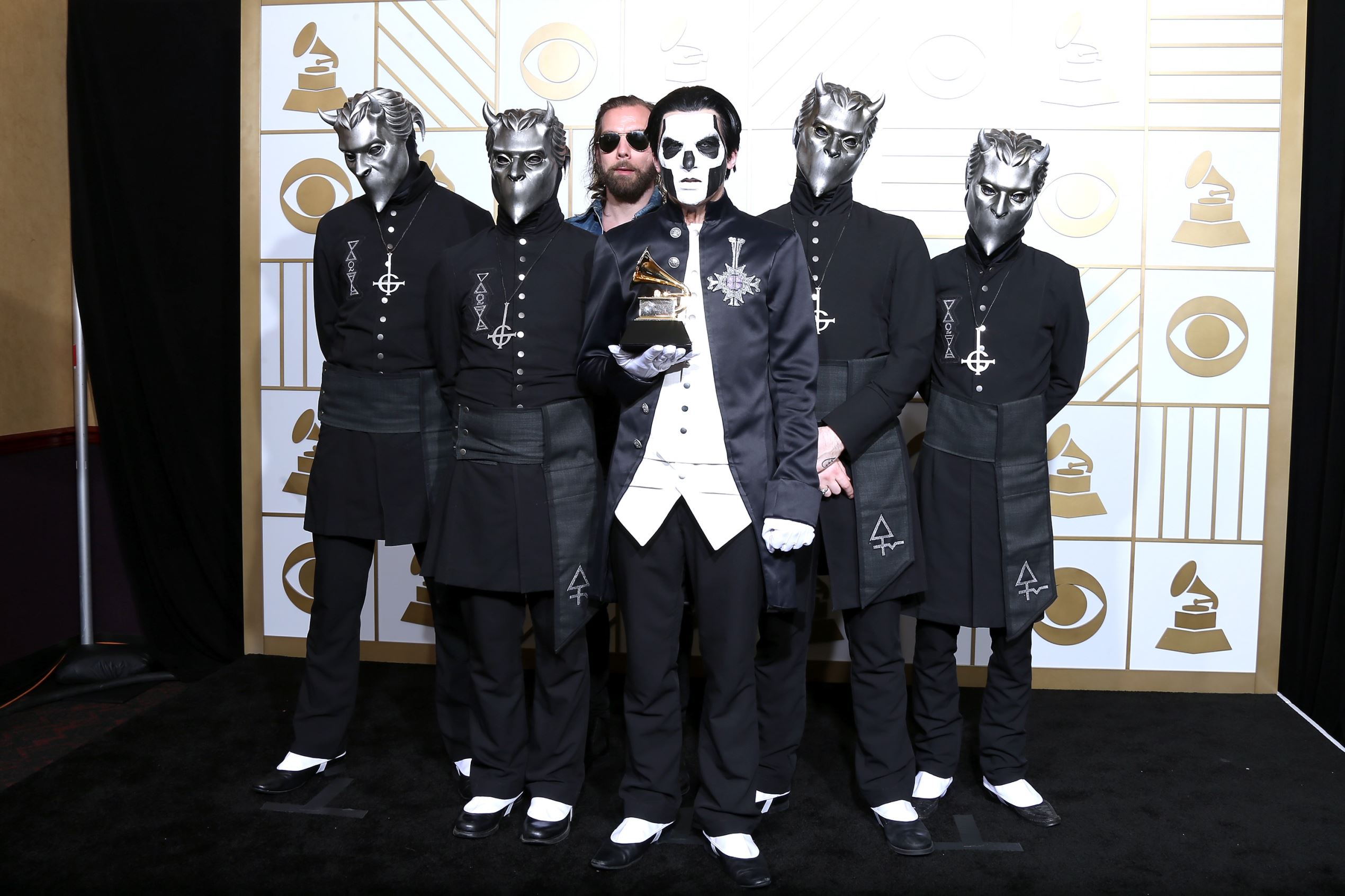 Musician Papa Emeritus III (C) and fellow members of Ghost, winners of the award for Best Metal Performance for 'Cirice,' poses in the press room during The 58th GRAMMY Awards at Staples Center on February 15, 2016 in Los Angeles, California.