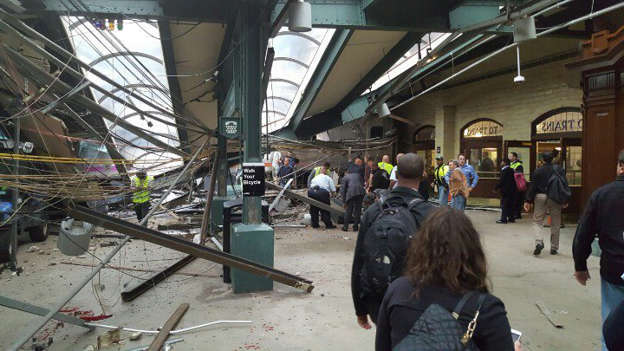 This photo provided by Ian Samuel shows the scene of a train crash in Hoboken, N.J., on Thursday, Sept. 29, 2016. A commuter train barreled into the New Jersey rail station during the Thursday morning rush hour, causing serious damage. The train came to 