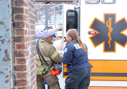 Emergency workers help an injured person at New Jersey Transit's rail station in Hoboken, New Jersey September 29, 2016.
A commuter train crashed into a station in New Jersey during the morning rush hour on Thursday, officials said, with dozens of people