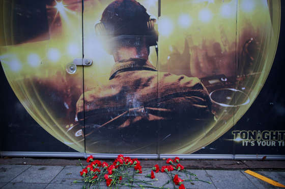 Flowers of the victims of the attack are placed outside a nightclub, which was attacked by a gunman overnight, in Istanbul, on New Year's Day, Sunday, Jan. 1, 2017. An assailant believed to have been dressed in a Santa Claus costume and armed with a long