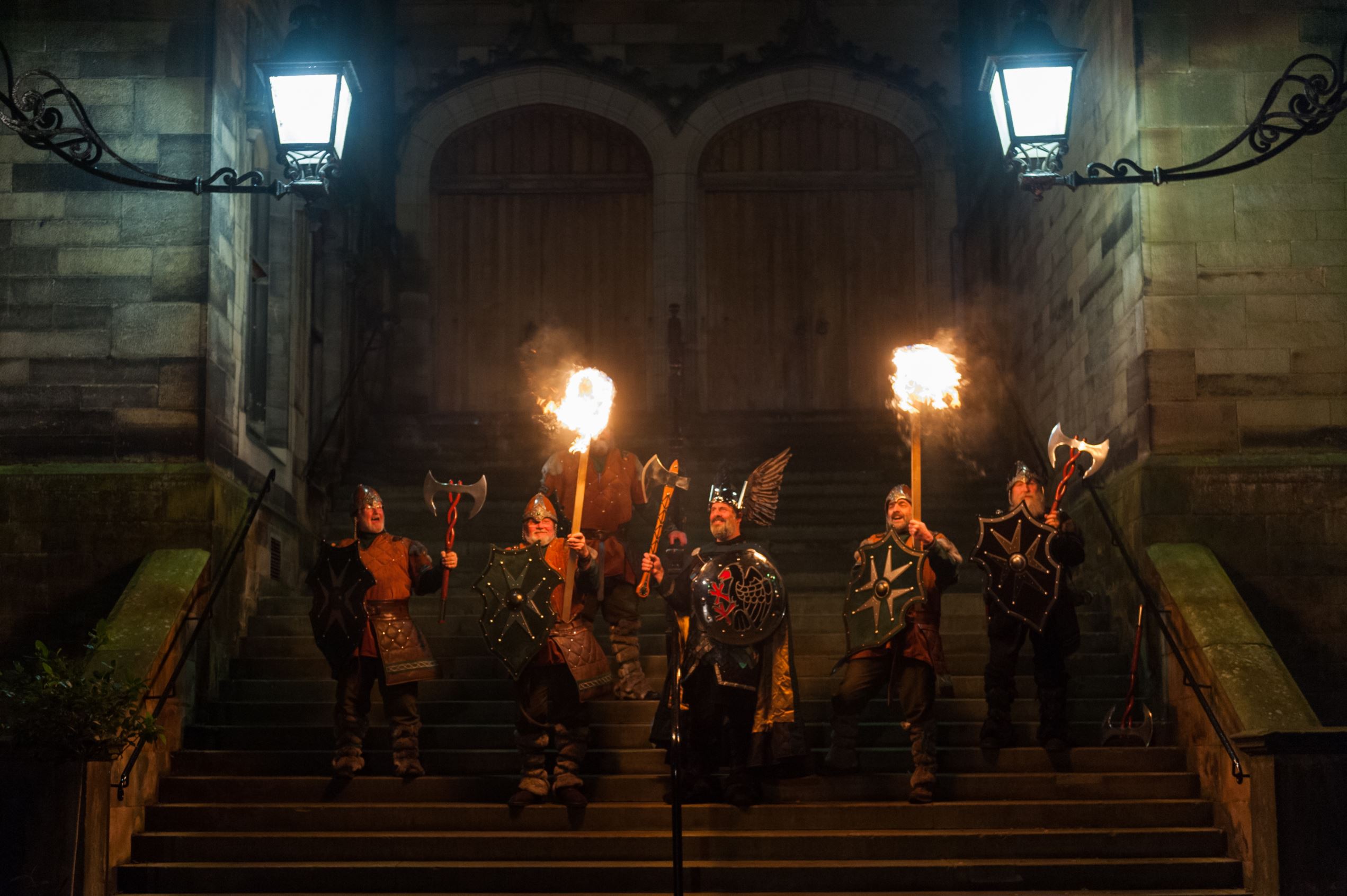 EDINBURGH, SCOTLAND - DECEMBER 30: Men dressed as vikings take part at a photocall before participating in the Torchlight Procession during Edinburgh's Hogmanay celebrations on December 30, 2015 in Edinburgh, Scotland. (Photo by Roberto Ricciuti/WireImage)