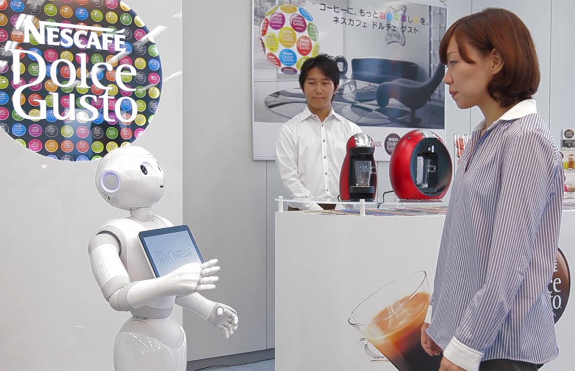 Diapositiva 15 de 31: Nestle uses SoftBank's Pepper robots to sell Dolce Gusto coffee pods and machines in department stores in Japan, as well as answer customer queries. More than just a gimmick, the robots have been rolled out to 1,000 stores in the country.